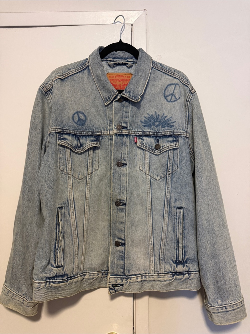 Levi's Light Blue Denim Jacket with Peace Sign Detail